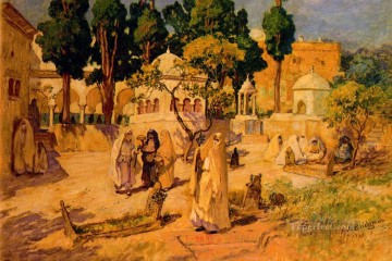 three women at the table by the lamp Painting - Arab Women at the Town Wall Frederick Arthur Bridgman